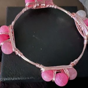 Pink wrapped metal bracelet